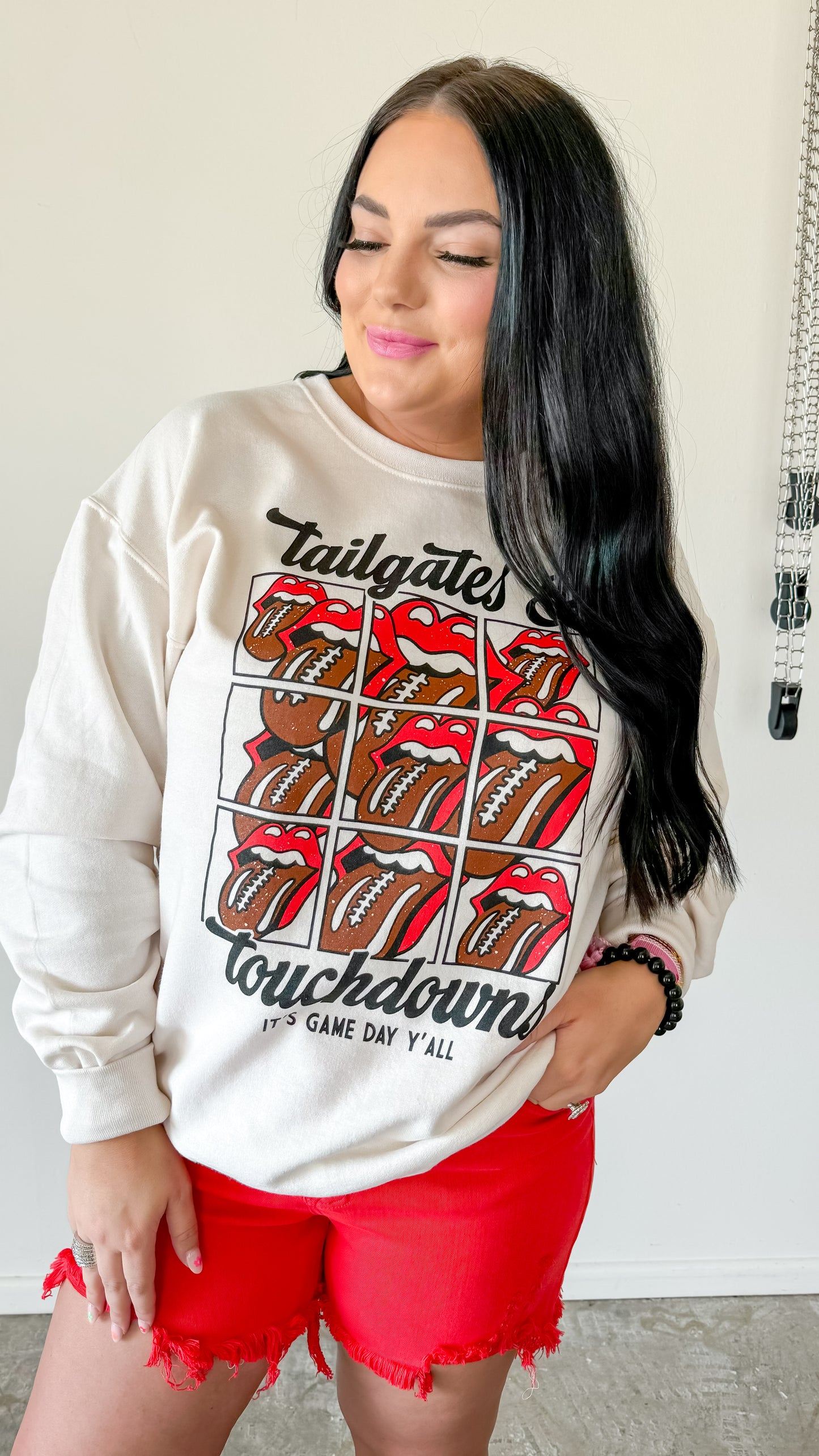 TAILGATES AND TOUCHDOWNS SWEATSHIRT